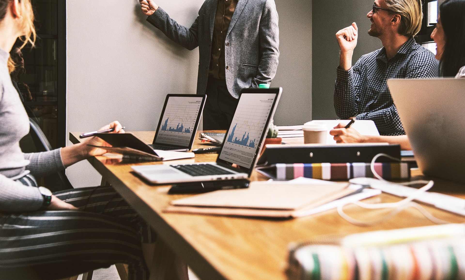 people around conference table working